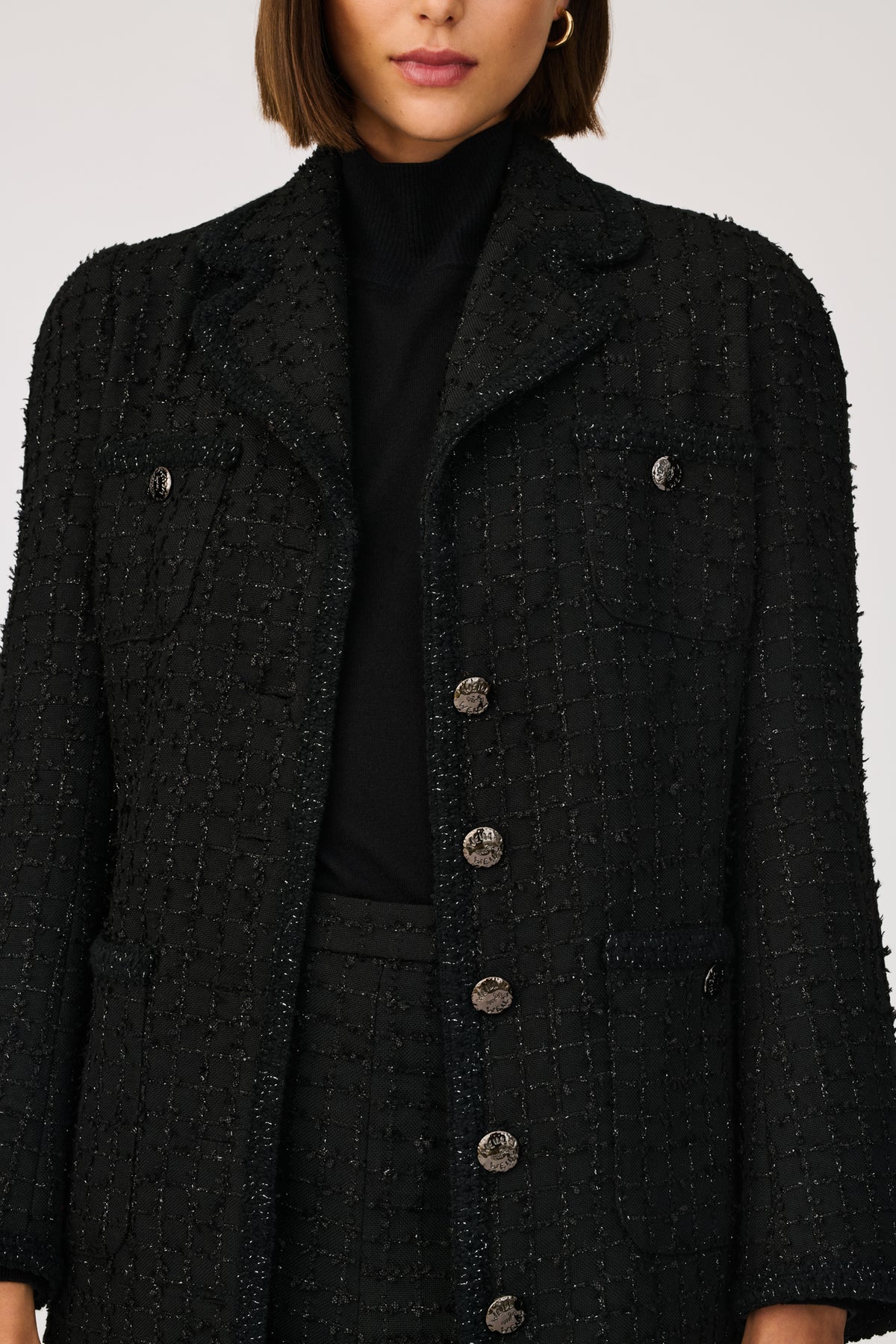 Manteau long en tweed galoné