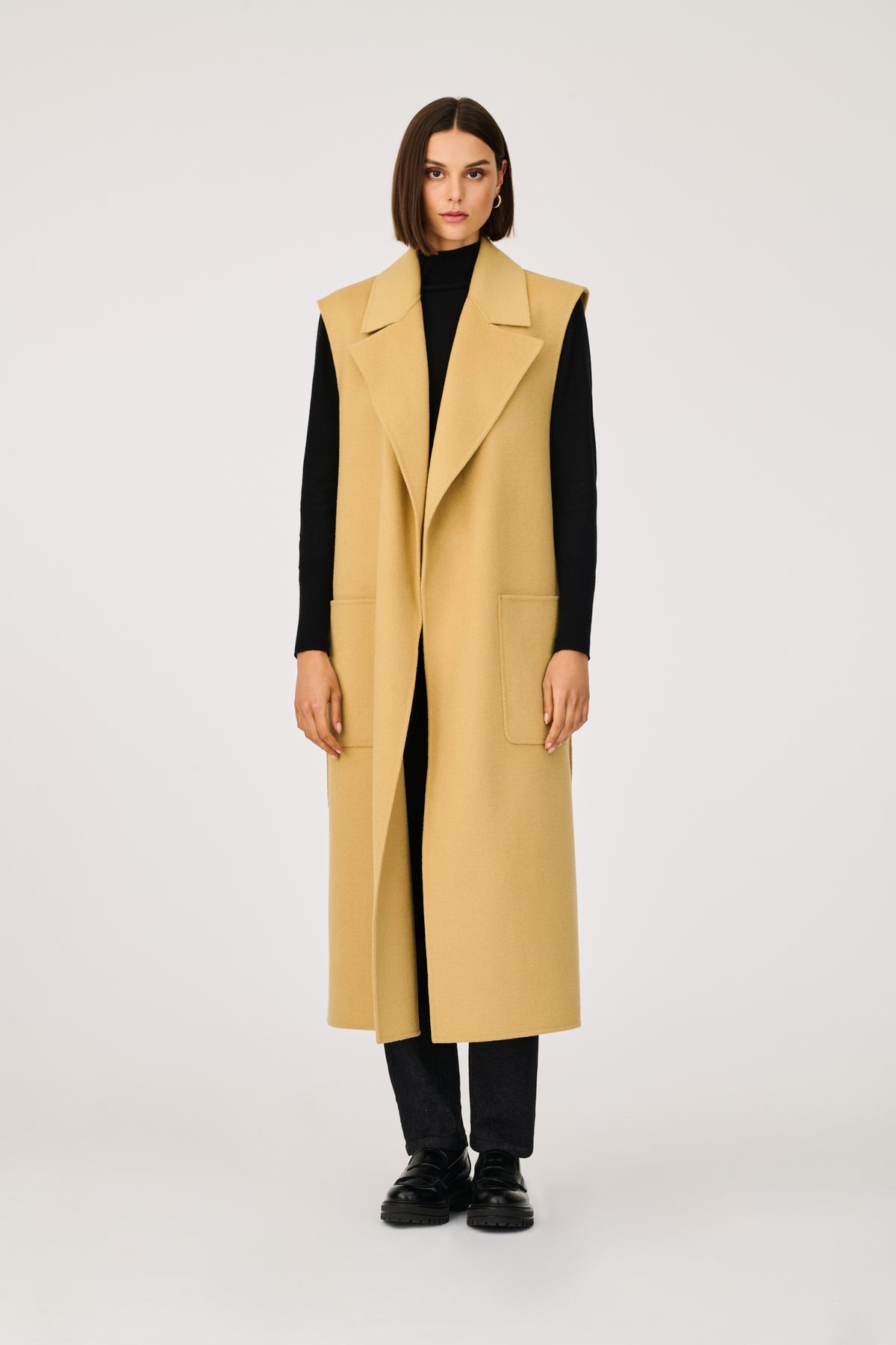 Manteau long double face sans manche