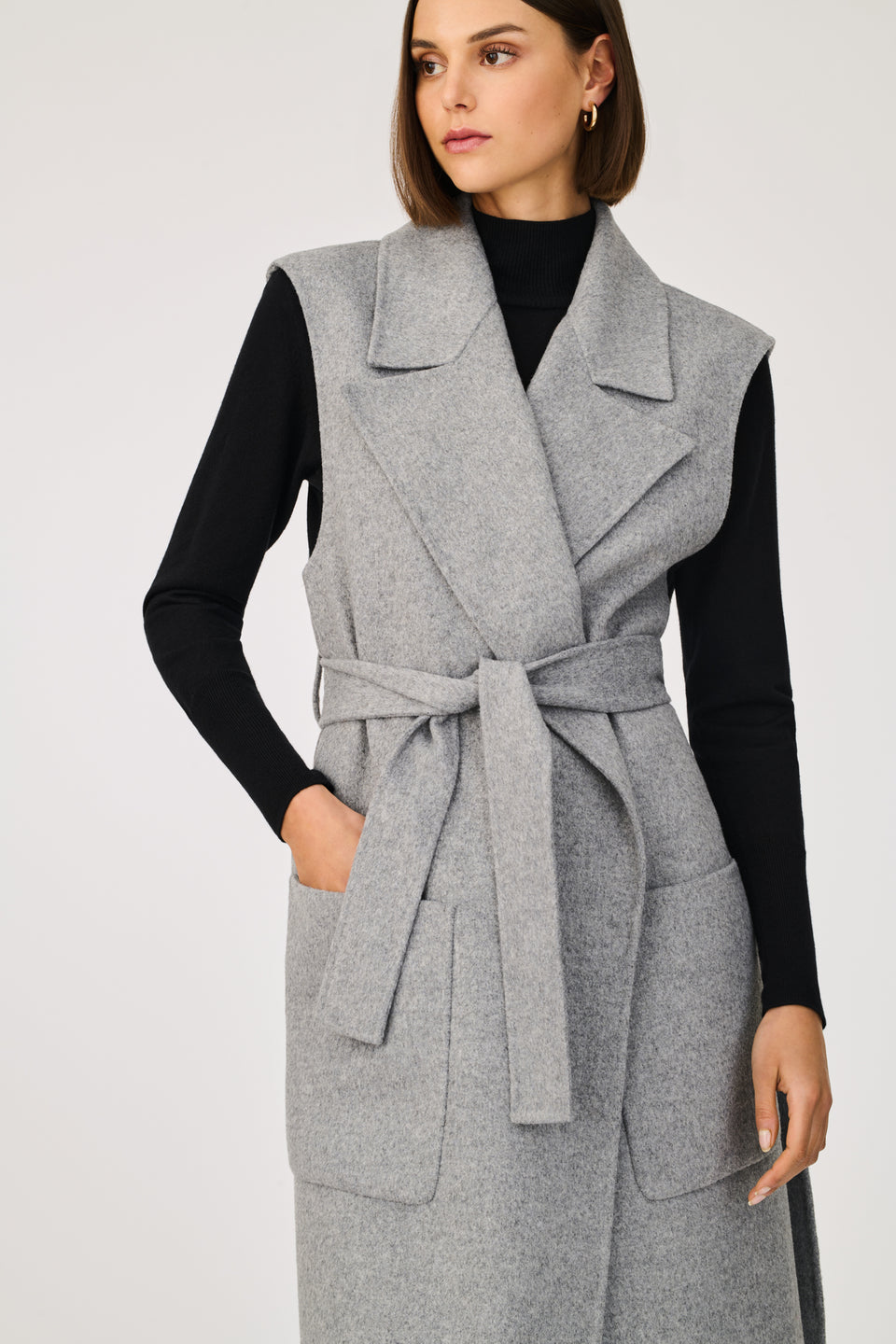 Manteau long double face sans manche